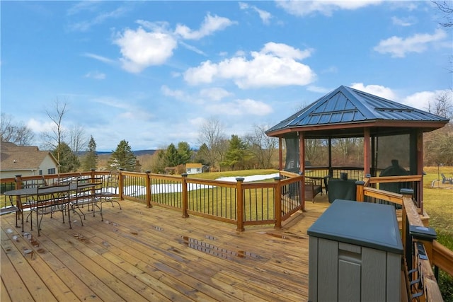 wooden terrace with a gazebo