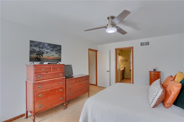 bedroom featuring baseboards, visible vents, ceiling fan, and light colored carpet