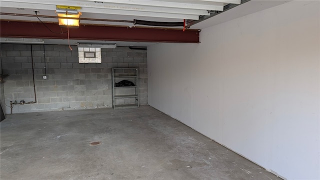 garage featuring concrete block wall