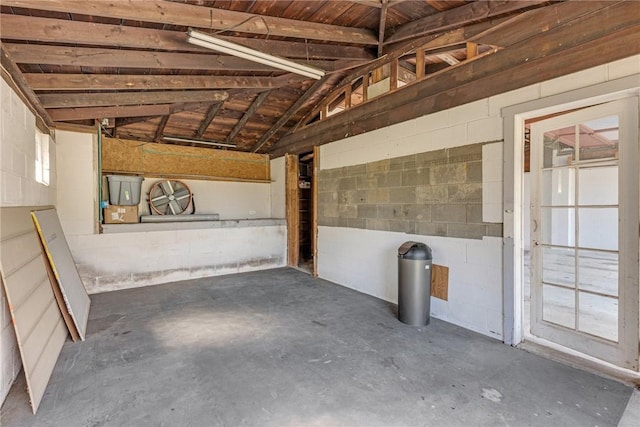 interior space featuring concrete block wall