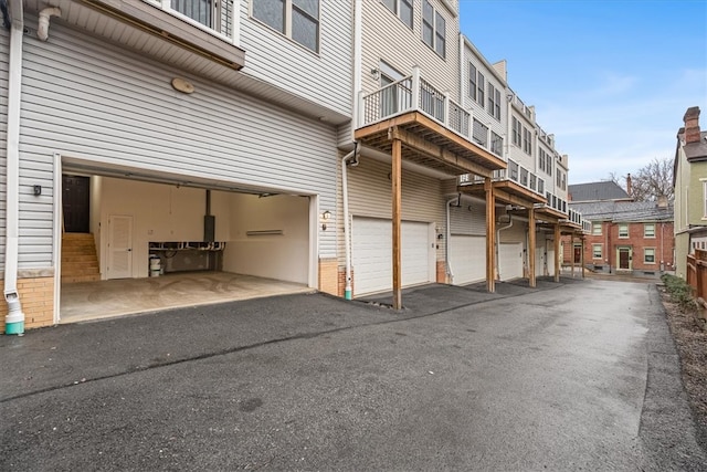 garage featuring driveway