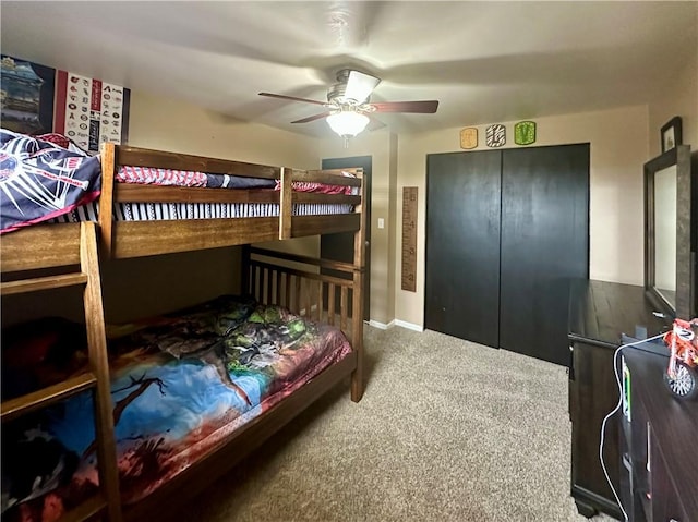 bedroom featuring a closet, carpet flooring, and ceiling fan