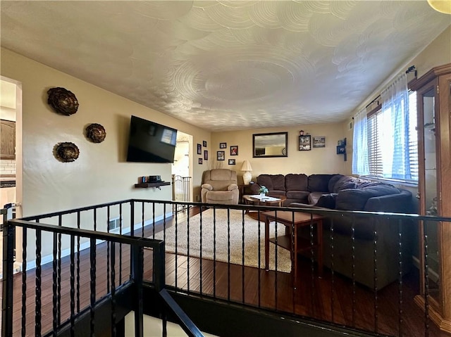 living room featuring baseboards