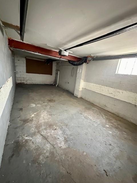 basement with concrete block wall