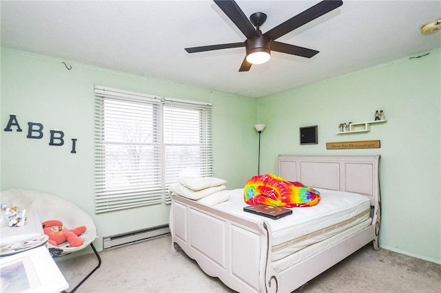 bedroom with light colored carpet, ceiling fan, and baseboard heating