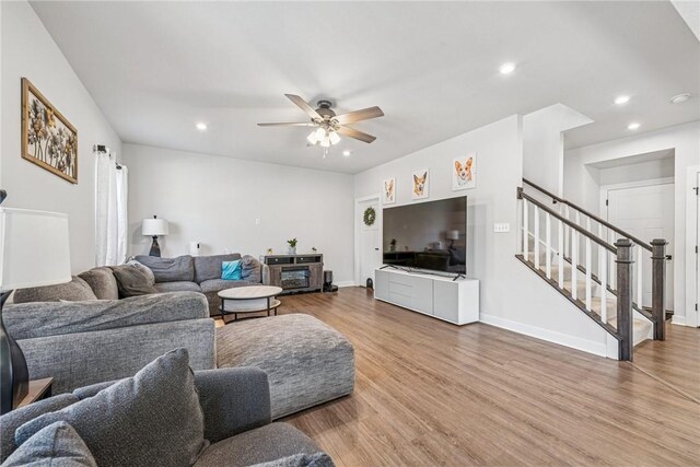 334 Crossing Dr, North Strabane, PA 15330 - living area with stairway, wood finished floors, ceiling fan, and recessed lighting