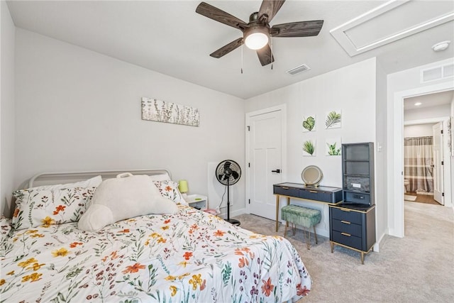 bedroom featuring light carpet, ceiling fan, and visible vents