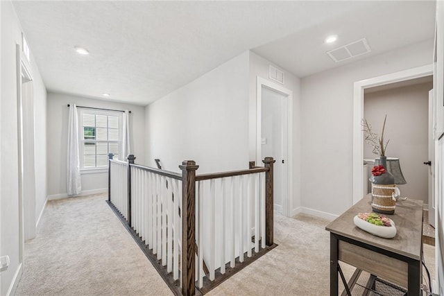 334 Crossing Dr, North Strabane, PA 15330 - hallway with an upstairs landing, light colored carpet, and recessed lighting