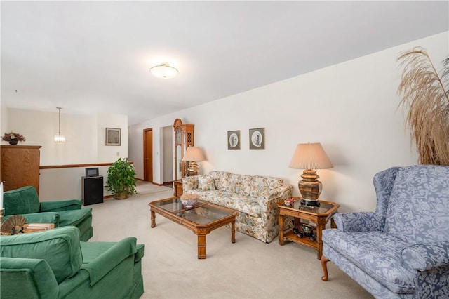 living area featuring carpet floors