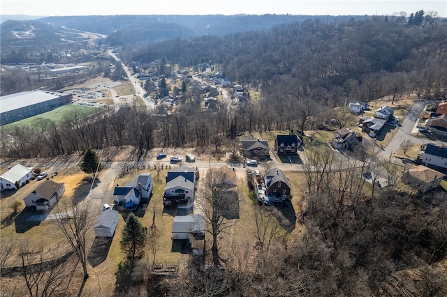 bird's eye view featuring a forest view