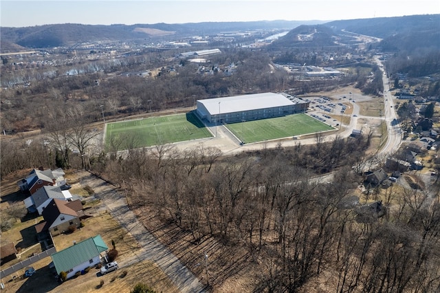 birds eye view of property with a mountain view