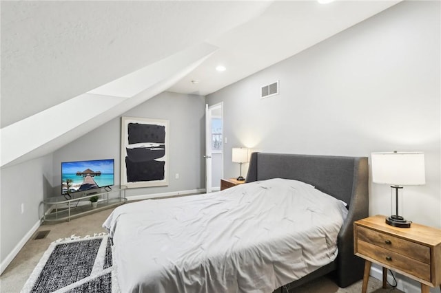 bedroom featuring baseboards, visible vents, vaulted ceiling, and carpet flooring