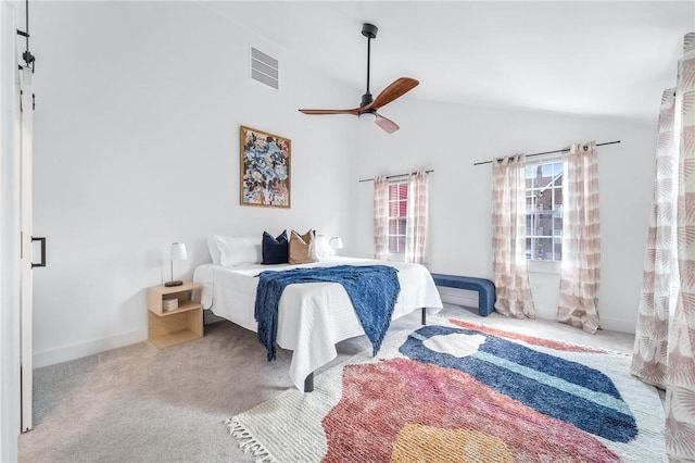 carpeted bedroom with high vaulted ceiling, visible vents, ceiling fan, and baseboards