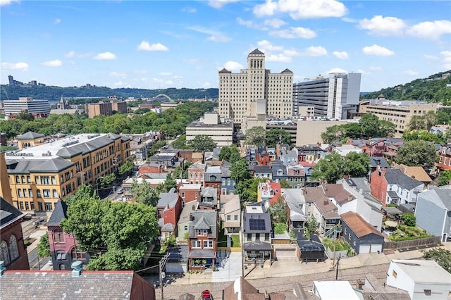 birds eye view of property featuring a city view