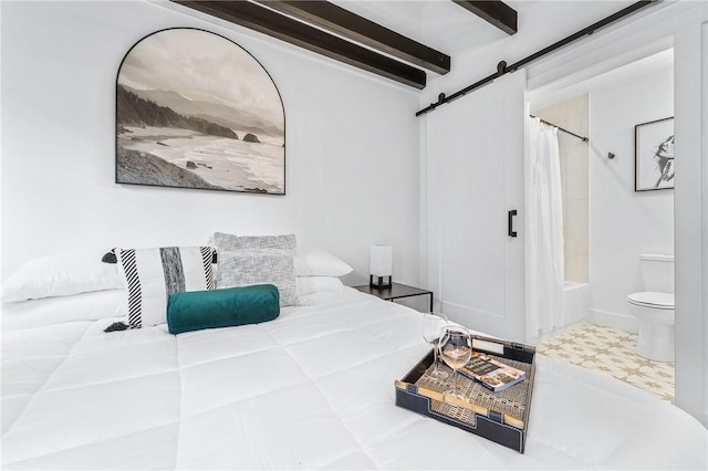 bedroom with tile patterned floors, beamed ceiling, and a barn door