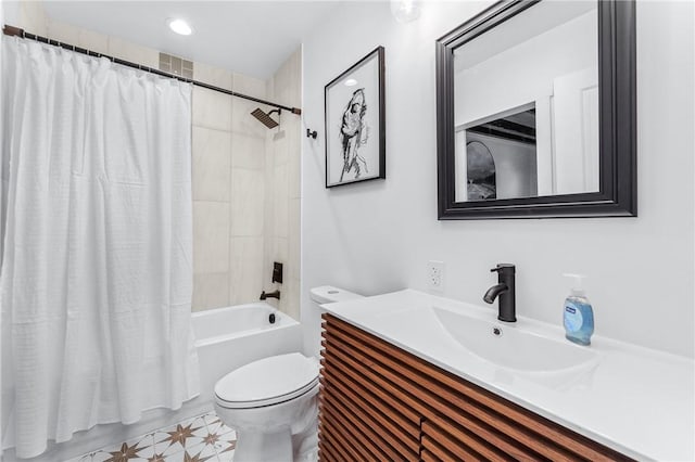 bathroom featuring toilet, shower / bath combination with curtain, and vanity