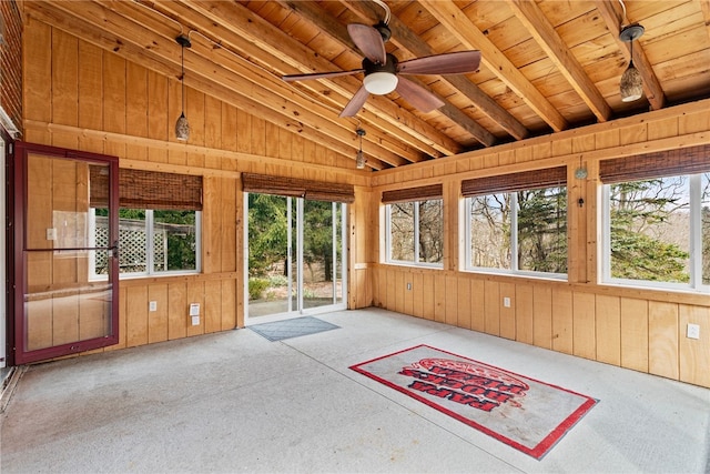 unfurnished sunroom with wooden ceiling, ceiling fan, and vaulted ceiling