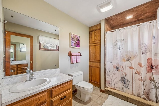 full bath featuring a shower with curtain, vanity, toilet, and tile patterned floors