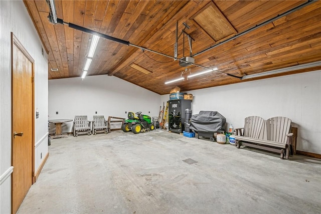 garage with a garage door opener and wood ceiling