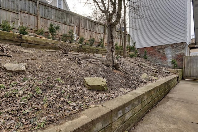 view of yard featuring fence