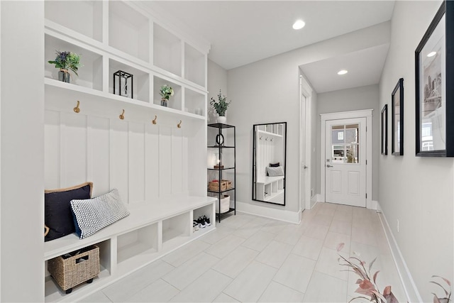 mudroom featuring baseboards and recessed lighting