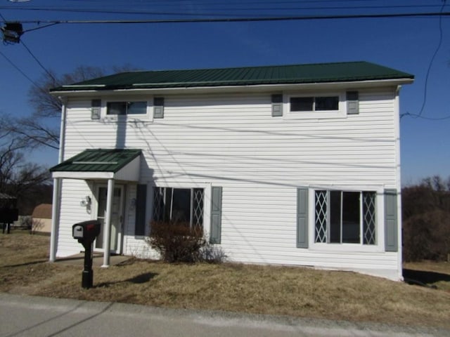 exterior space with metal roof