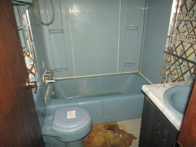 full bathroom featuring toilet, shower / bath combination, and vanity