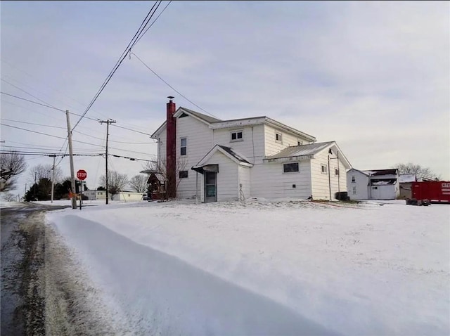 view of snow covered property