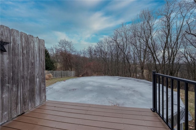 wooden deck featuring fence