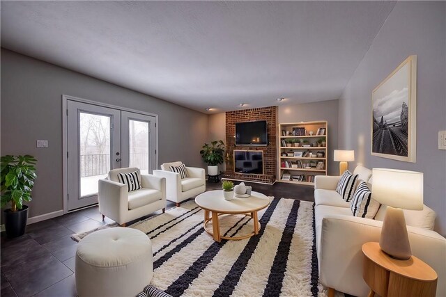 living room featuring french doors and baseboards