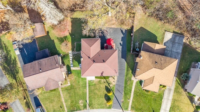 birds eye view of property with a residential view