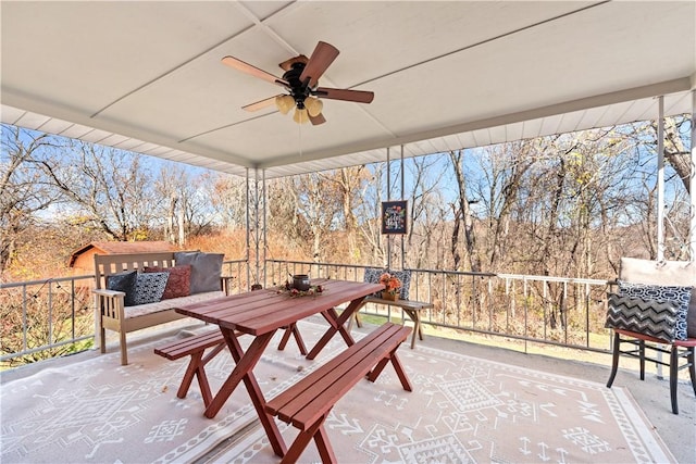 view of patio / terrace featuring a ceiling fan and outdoor dining space