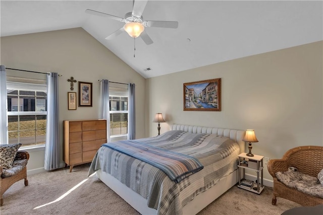 bedroom with lofted ceiling, visible vents, baseboards, a ceiling fan, and carpet