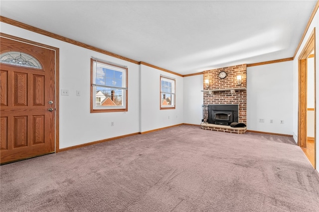 unfurnished living room with carpet floors, ornamental molding, and baseboards