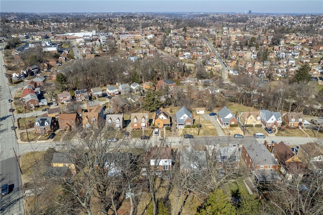 birds eye view of property with a residential view