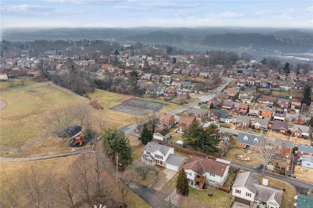 birds eye view of property with a residential view