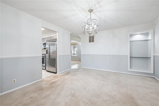 empty room with light carpet, a notable chandelier, baseboards, and crown molding