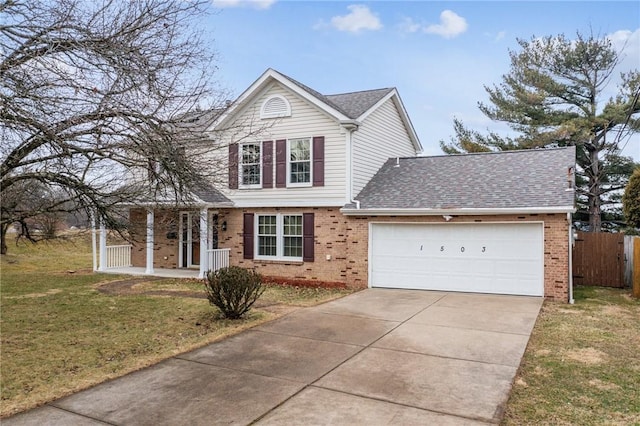 traditional-style home featuring brick siding, concrete driveway, a front yard, fence, and a garage