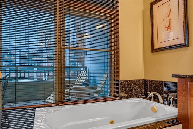 full bath featuring a whirlpool tub