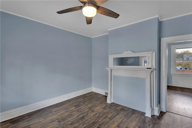 unfurnished living room featuring ceiling fan, ornamental molding, wood finished floors, and baseboards