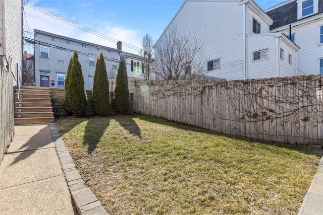 view of yard featuring a fenced backyard