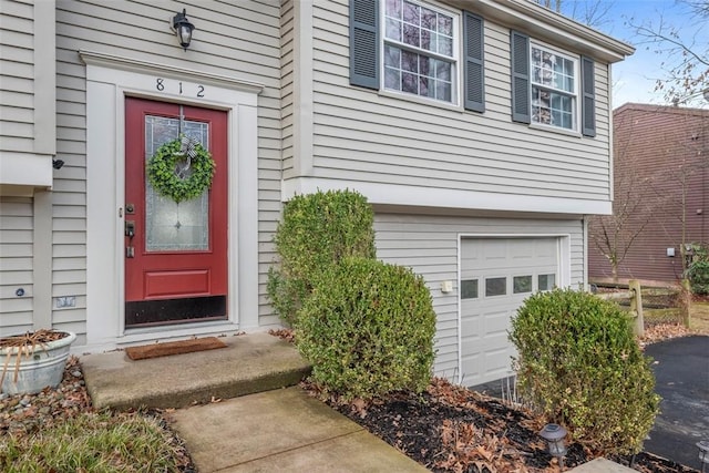 property entrance featuring a garage