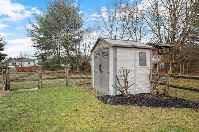 view of shed featuring fence private yard