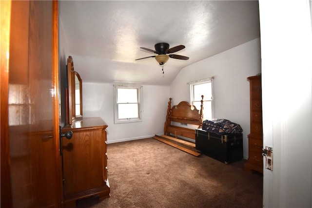 additional living space featuring lofted ceiling, carpet flooring, and a ceiling fan