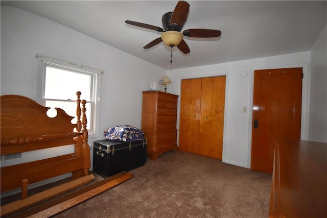 bedroom with carpet floors, ceiling fan, visible vents, and a closet