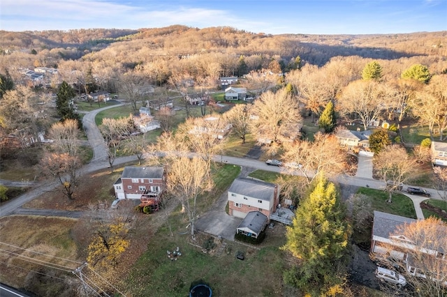 bird's eye view featuring a view of trees