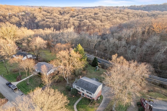 drone / aerial view with a view of trees