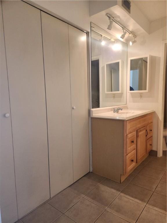 bathroom featuring vanity and tile patterned floors