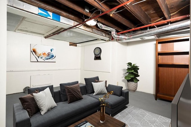 living room featuring finished concrete floors