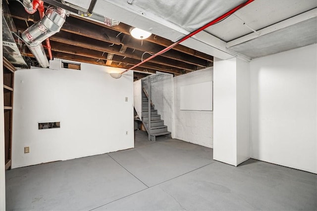 unfinished basement with stairway